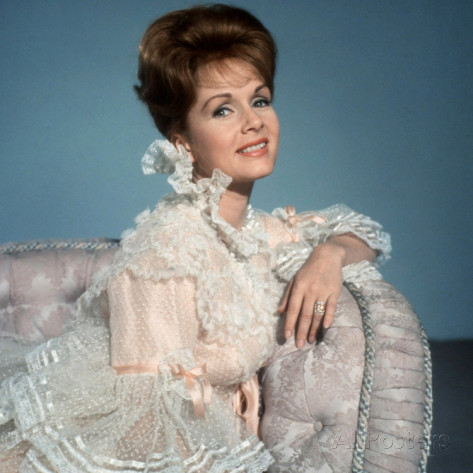 Debbie Reynolds in a movie still from The Unsinkable Molly Brown